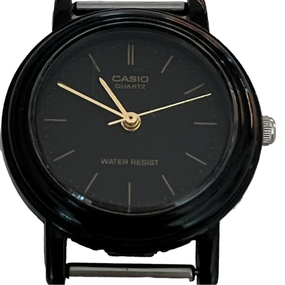 Casio Black Watch Face Gold arms Water Resistant​